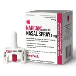 A box of Naloxone HCI Nasal Spray sitting next to the nasal spray applicator